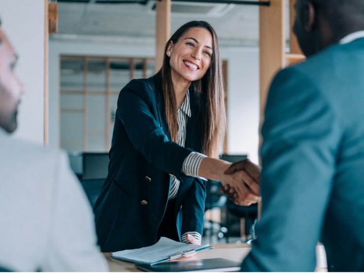 Business people shaking hands in the office.