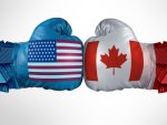 Deux gants de boxe l'un face à l'autre, l'un avec les couleurs du drapeau du Canada et un avec les couleurs du drapeau des États-Unis.